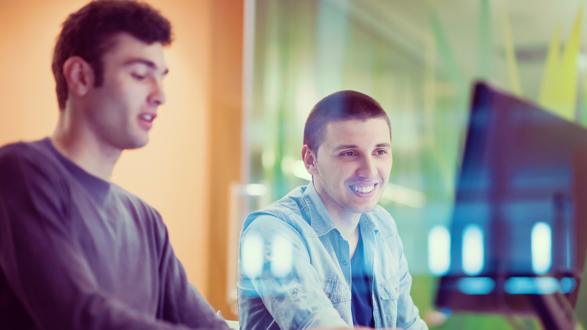 Two males students at a computer